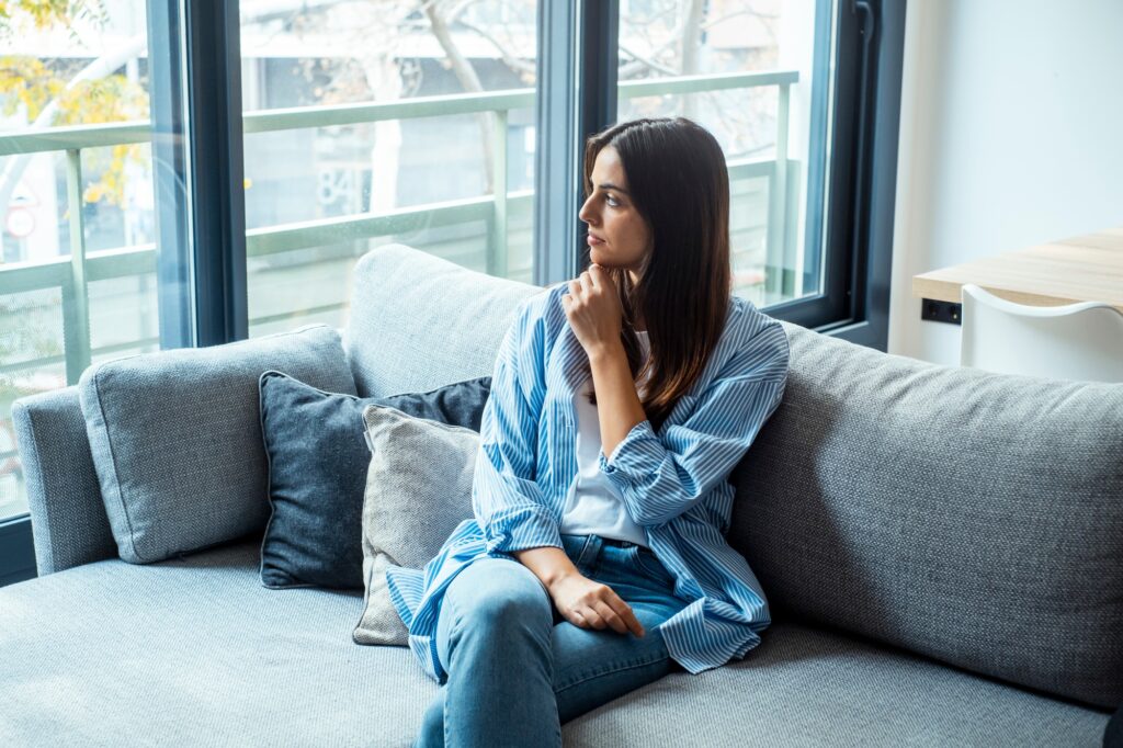 Sad, unhappy. Alone thoughtful young woman, girl expression face thinking