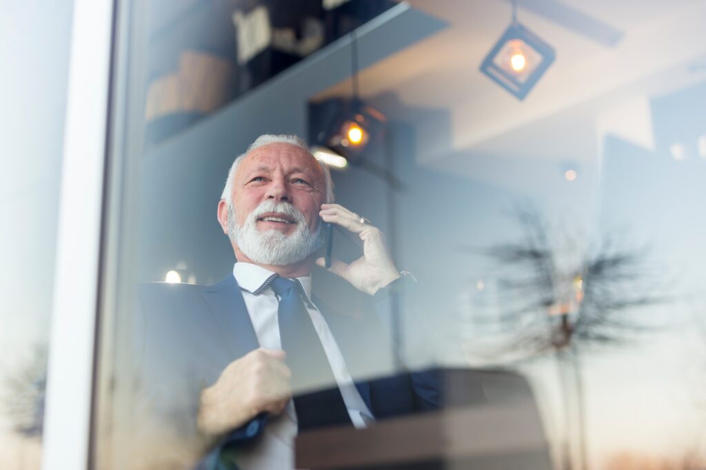Senior businessman speaking on the phone