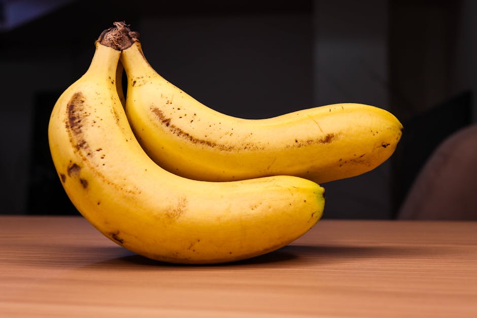 A ripe banana on a kitchen table with a subtle science concept