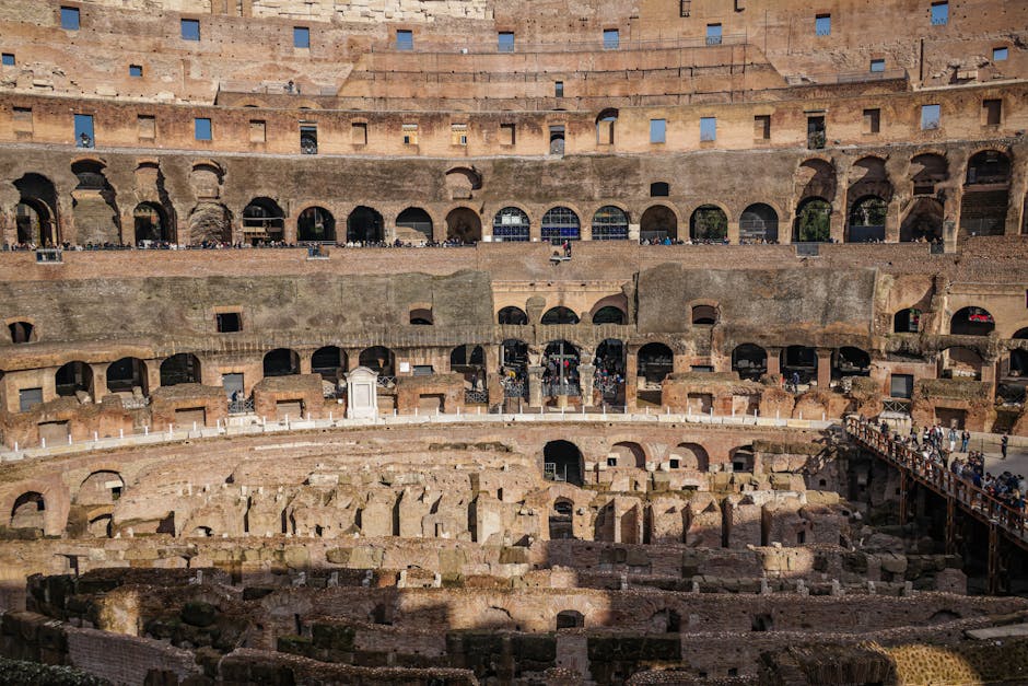 Roman gladiators fighting in the Colosseum arena