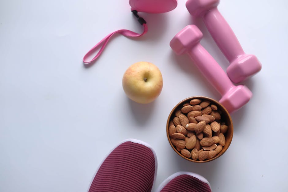 Healthy lifestyle scene with green tea, balanced meal and exercise gear