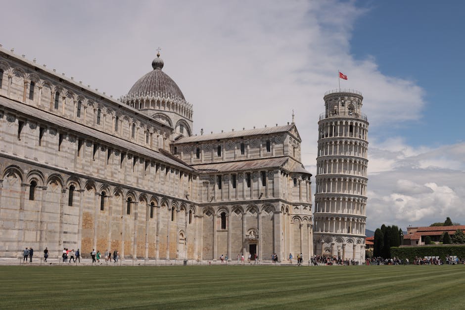 Tourists climbing the interior stairs of the Leaning Tower of Pisa
