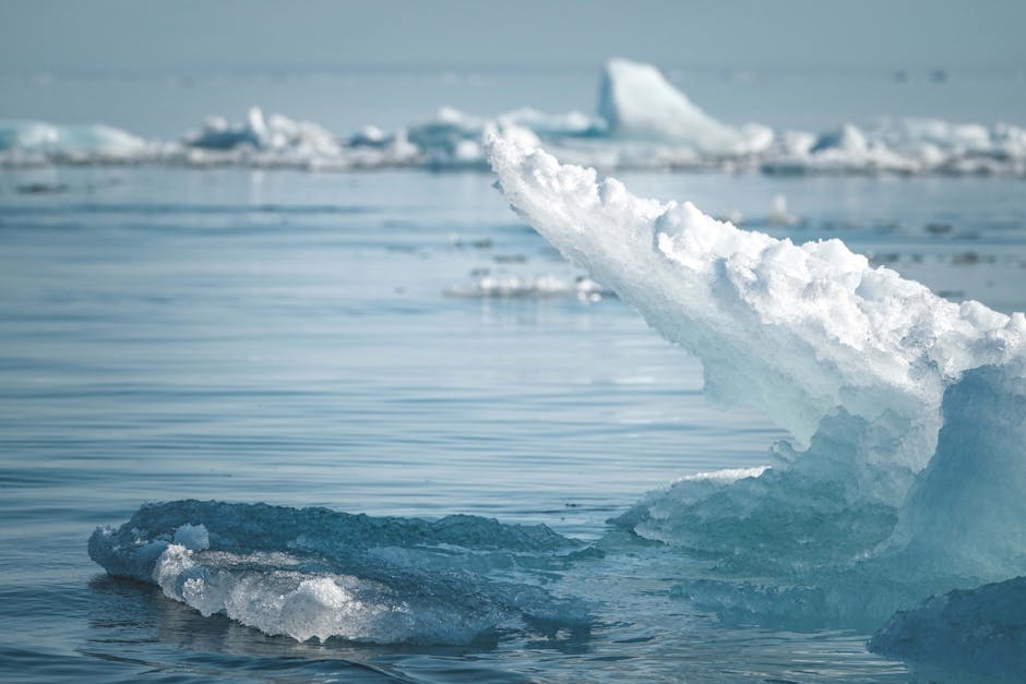 Melting glacier and rising ocean water representing climate impact