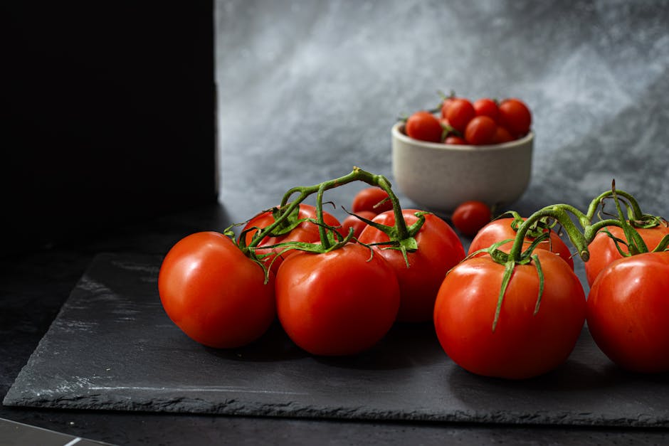 Fresh ripe tomatoes in a kitchen bowl, ready for cooking