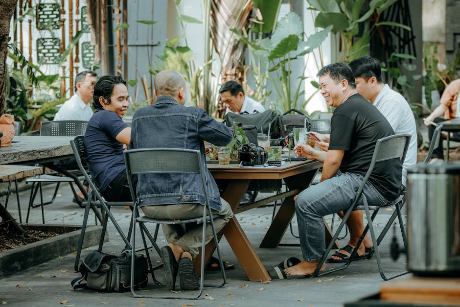 Group of friends laughing and interacting socially