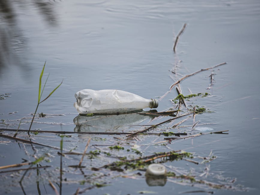 Plastic bottle floating in ocean water