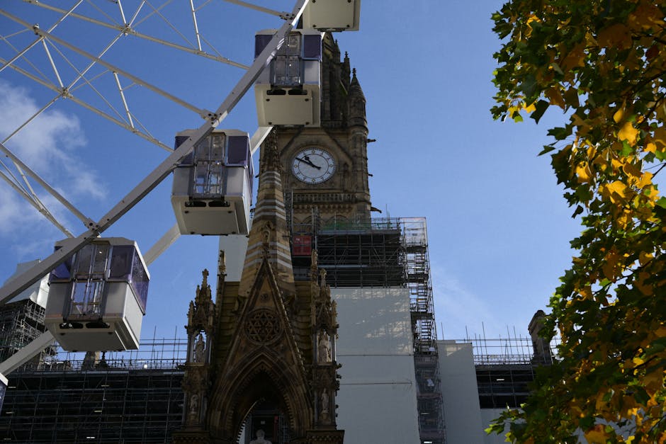 Engineers and restoration equipment stabilizing a historic tower