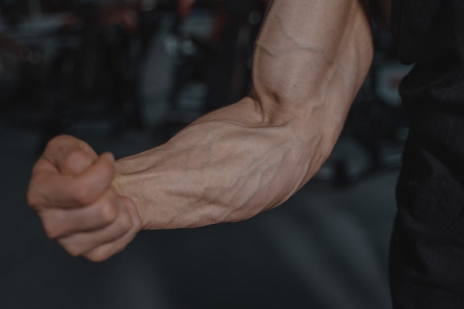 Person examining an arm under different lighting conditions to compare vein visibility