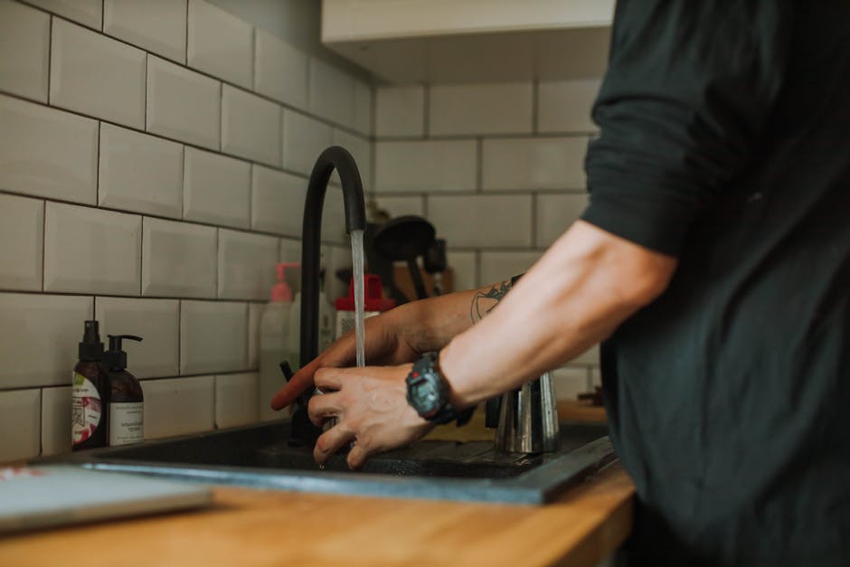 Kitchen floor with tile and stainless steel surface concept