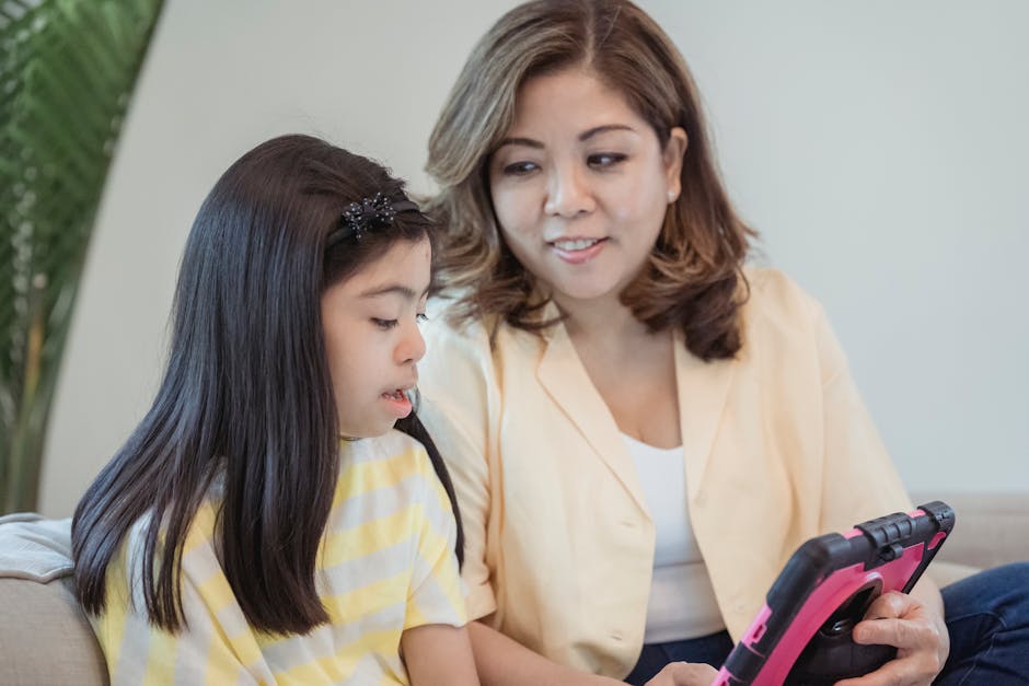 Child using tablet near a home router with parent nearby