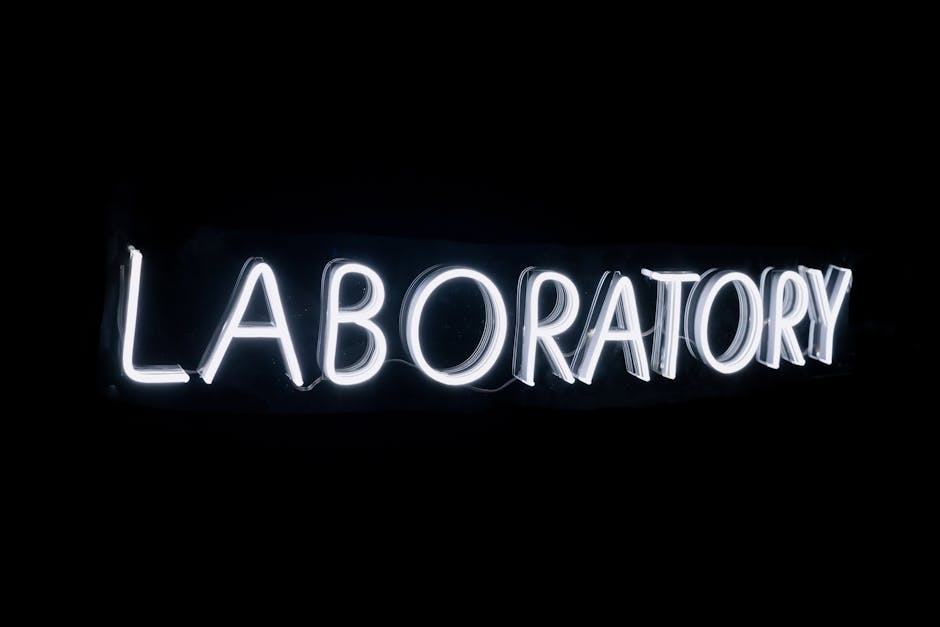 Fluorescent screen glowing green in a dark laboratory experiment