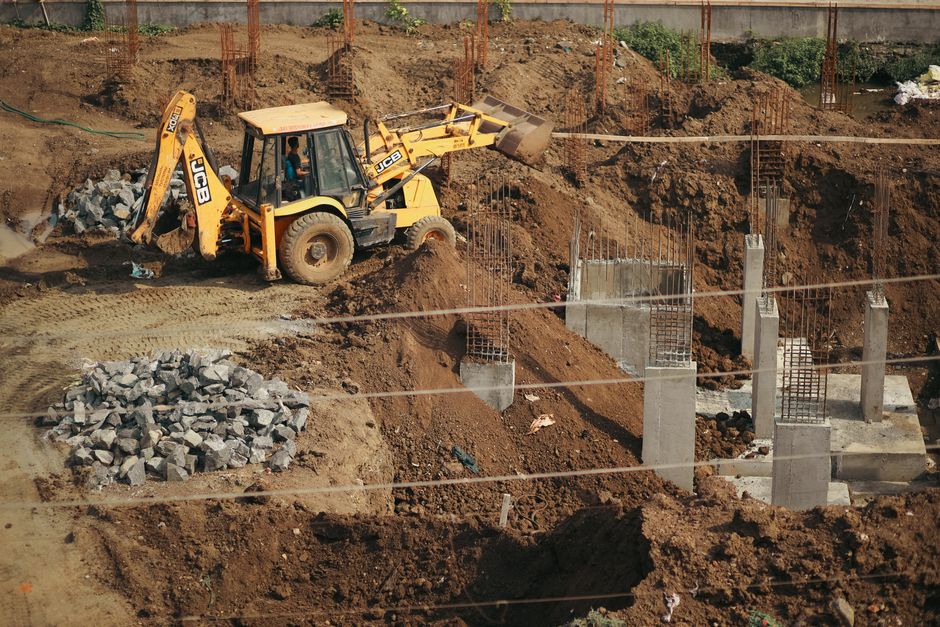 Construction site with concrete and sand materials
