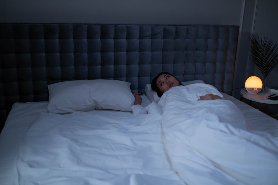 Sleep study concept with notebook, moonlight and bedroom scene