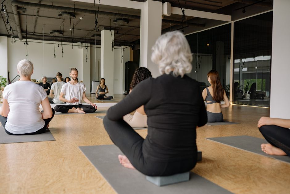 People doing laughter yoga in a wellness class