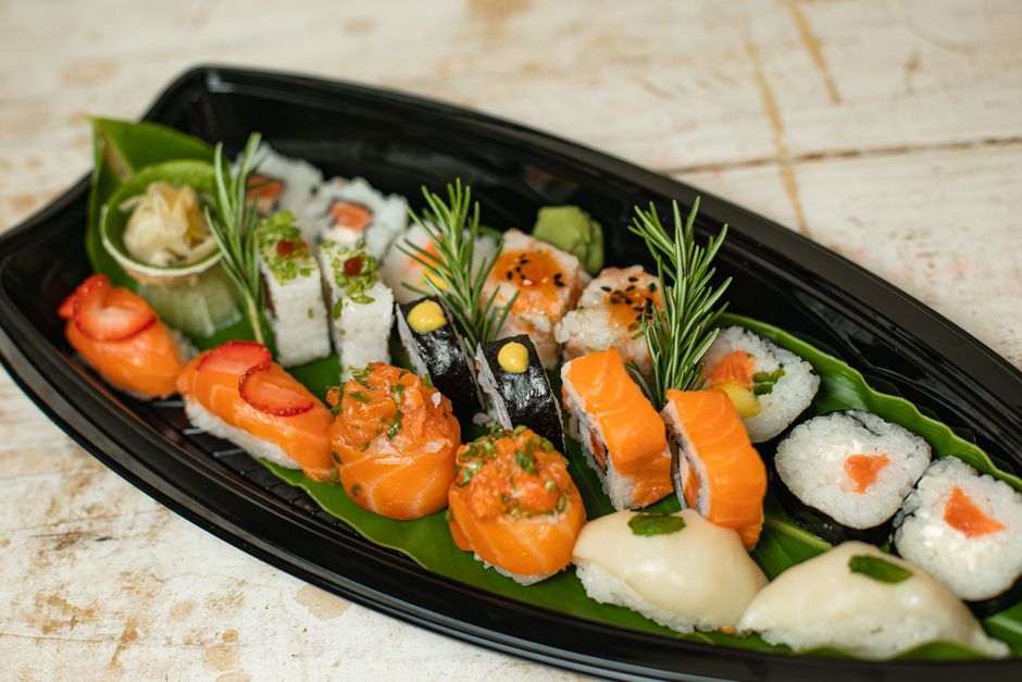 Delectable sushi platter featuring various types of nigiri and maki rolls.